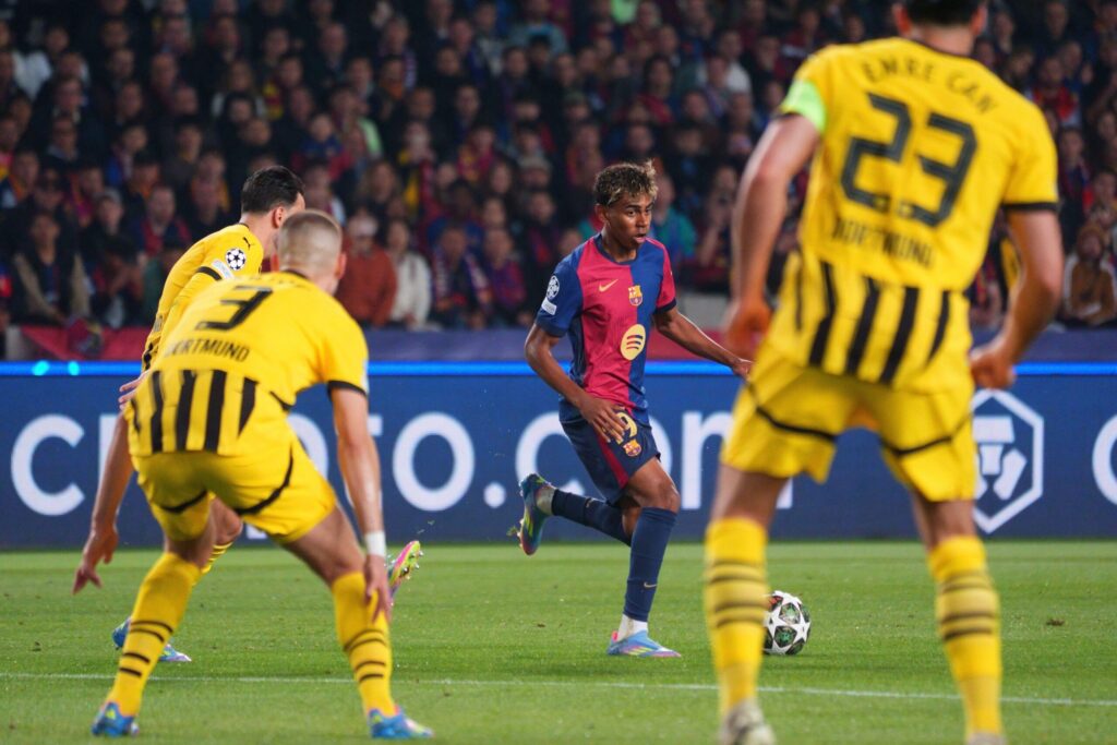 9th April 2025; Estadi Olimpic Lluis Companys, Barcelona, Spain, UEFA Champions League Quarter Final Football, Barcelona versus Borussia Dortmund; Lamine Yamal of Barcelona surrounded by the Dortmund defense